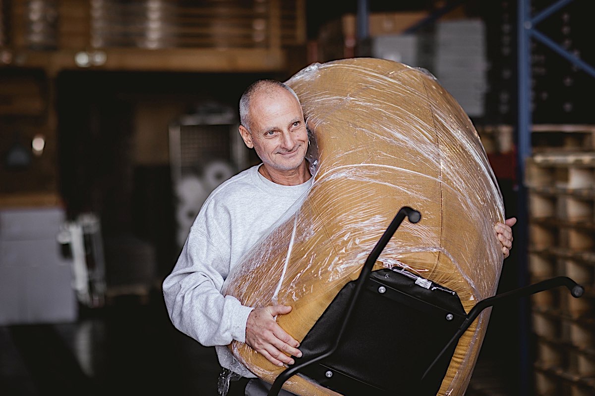 Best Movers team carrying furniture during a private move in Switzerland